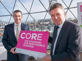 Niall Martindale, Director of Regulation and Pricing for firmus energy is presented with the Silver CORE accreditation by Kieran Harding, Managing Director of Business in the Community NI, recognising firmus energy’s achievement and commitment to Corporate
