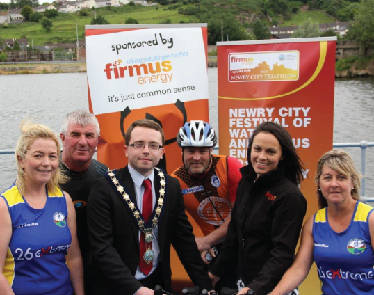 Image: Clodagh Loughran, Newry City Runner, Noel Pepper, Newry Triathlon Club, Mayor of Newry and Mourne District Council, Councillor Daire Hughes, Pat Conlon, Newry Triathlon Club, Angeline Sloan, firmus energy and Maureen O'Hara, Newry City Runner