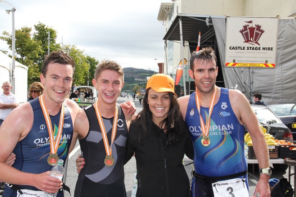 Image: Angeline Murphy, firmus energy, with the three male Newry Triathlon 2014 winners
