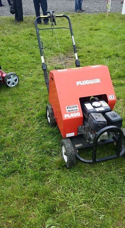 Lawn aerator machine in action at the North West Garden Show