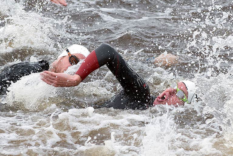 Image: Triathletes swimming in the foyle Derry